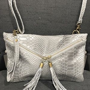 Italian leather shoulder bag with tassels